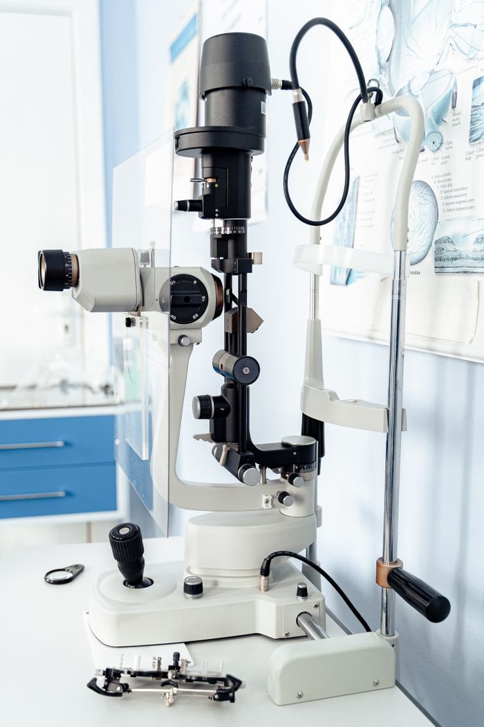Close-up of a slit lamp biomicroscope in an eye care clinic.