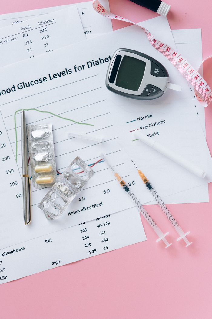 About Essential diabetes management tools including glucometer, syringes, and pills.